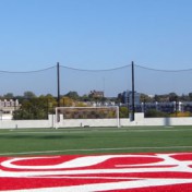 Back-up netting on soccer field.