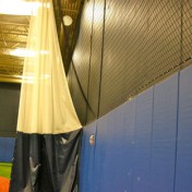 Divider curtain at indoor sports complex.