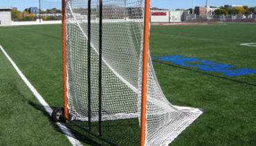 Lacrosse goal on cart for easy movement of goals.