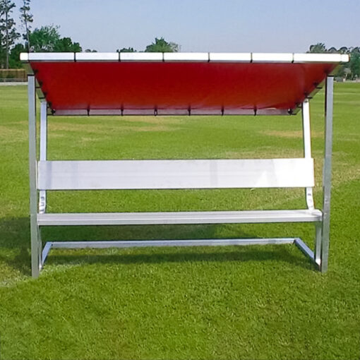 Covered aluminum athletic team bench. 8' long. Red canvas cover.