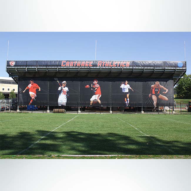 Bleacher wrap with custom logo and pictures.