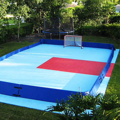 Model #FSP12-FSP44. Royal blue portable padding boundary for outdoor hockey rink.