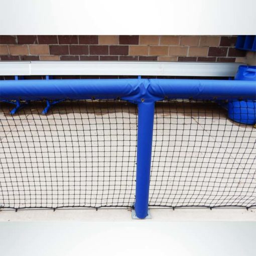 Royal blue padding on dugout rails for baseball or softball dugouts.