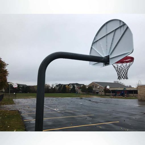Model #KG4908. 8' Gooseneck basketball pole on grade school playground.