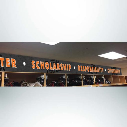 Locker room banding above lockers with character building words in black, orange and white.