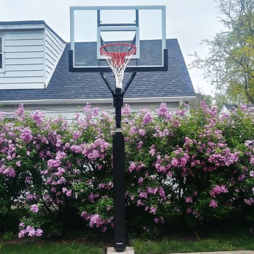 Model #CONTENDERINGL. Goalsetter Contender backyard basketball hoop shown installed in driveway.