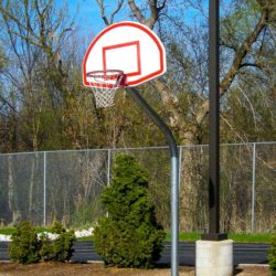 Model #KG460. Gooseneck basketball pole with 60 degree angle and 4' offset for use on playgrounds.