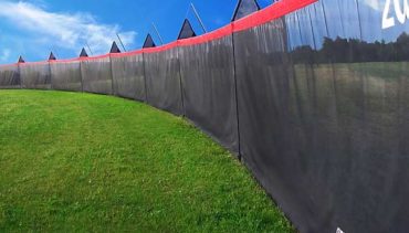 Grandslam Specto portable fence for softball and baseball.
