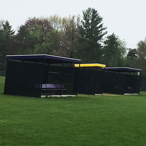 Model #1020. Two 10' x 20' World Series dugouts with windscreen for softball and baseball field.