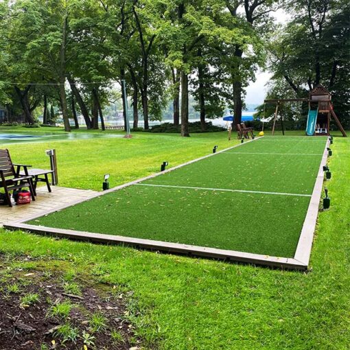 Artificial turf for backyard bocci ball.