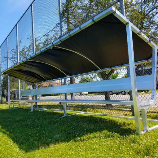 Covered aluminum athletic team bench.