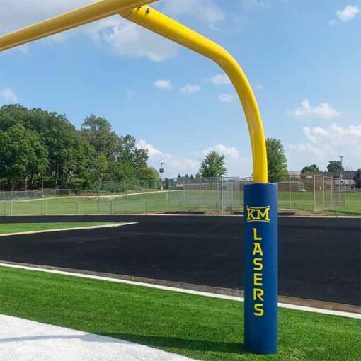 Blue padding with yellow logo on football goalpost with a 6' overhang.